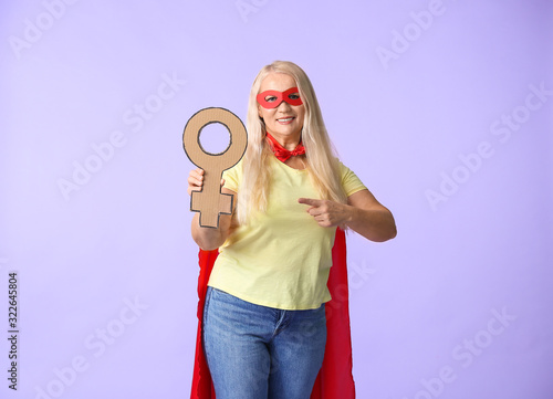 Lady in superhero costume h...