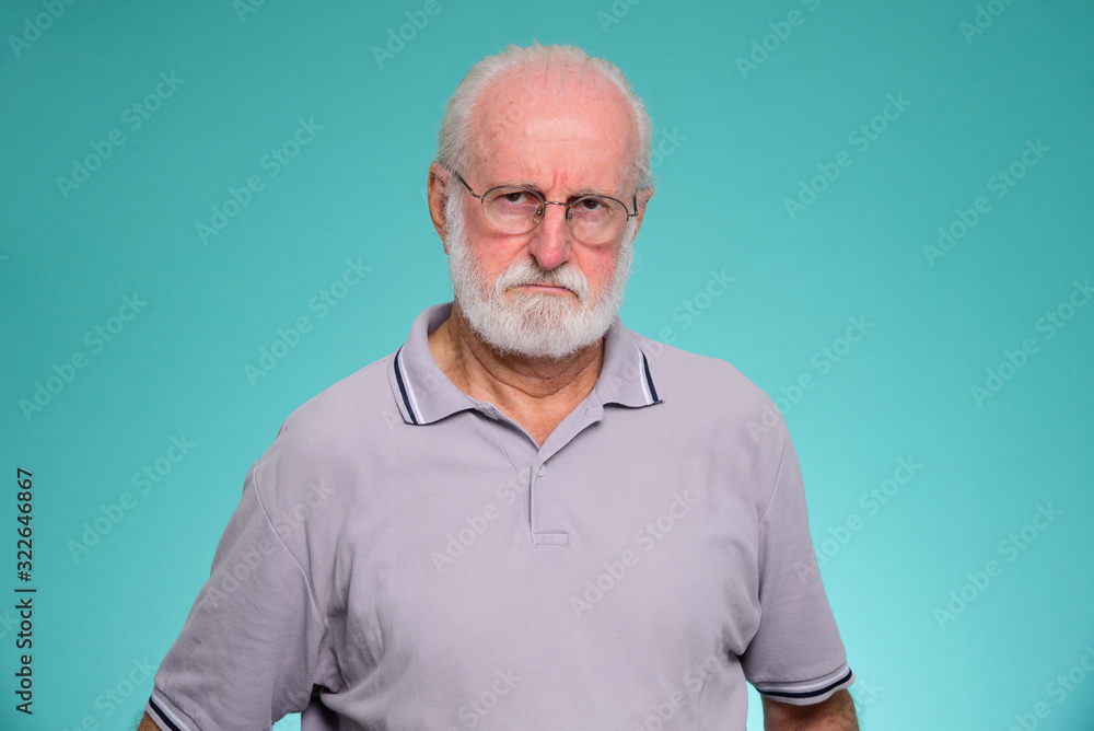 Elderly Man Face Expression Concept, sad and worried grandfather on green background Elderly Man Face Expression Concept, sad and worried grandfather on green background