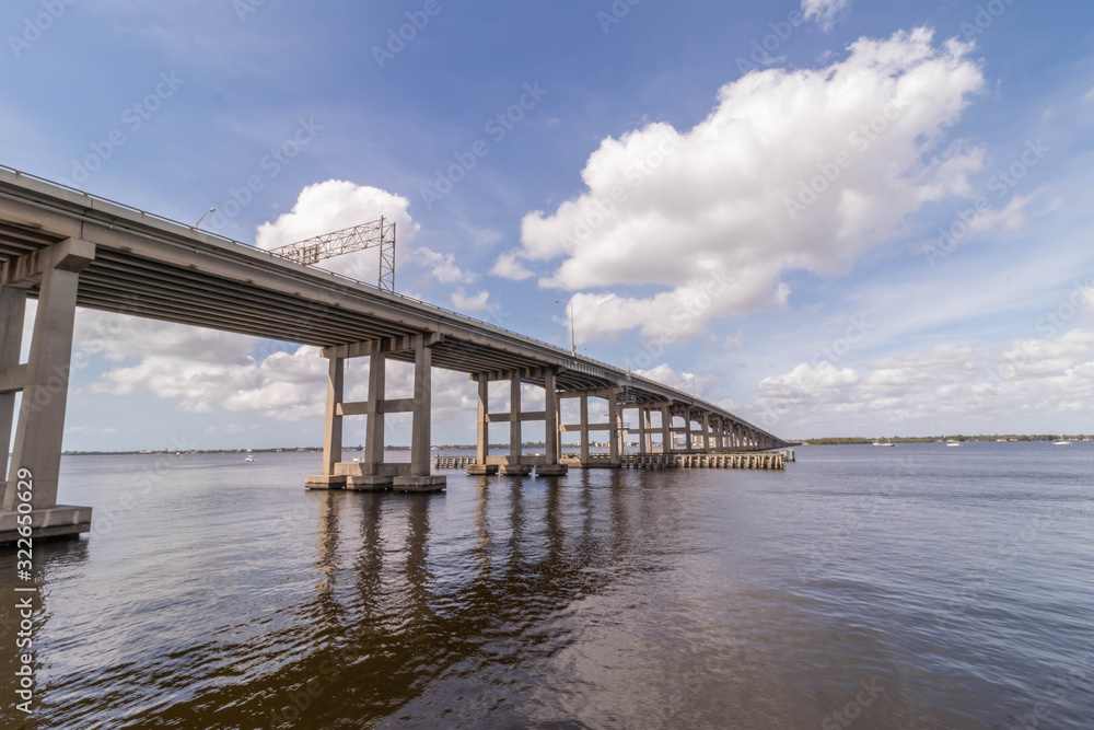 Landscape of the Edison bridge going over the Caloosahatchee River this bridge connects Cape Coral to Fort Myers Florida shot from centennial park peir
