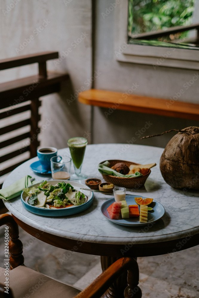 Table breakfast setting on the balcony in the jungle Table breakfast setting on the balcony in the jungle