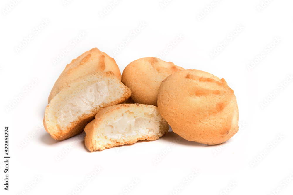 Cookies with a creamy top in a cut isolated on a white background.