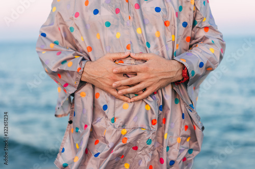 Wallpaper Mural man with hands on belly Torontodigital.ca