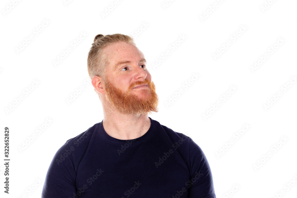 Red haired man with long beard thinking Red haired man with long beard thinking