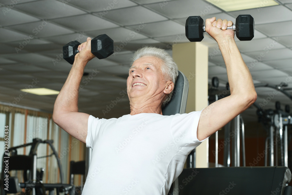 Close up portrait of elderly man in gym Close up portrait of elderly man in gym