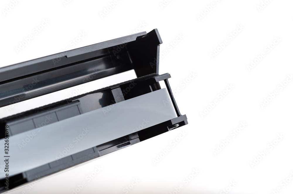 VHS video cassette closeup magnetic tape on a white background. isolated on white background VHS video cassette closeup magnetic tape on a white background. isolated on white background