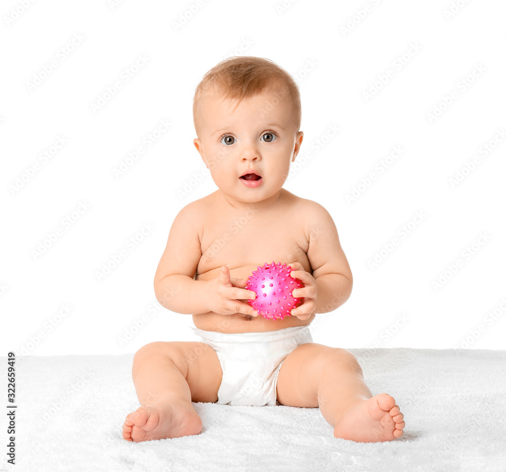 Cute little baby with toy ball isolated on white Cute little baby with toy ball isolated on white