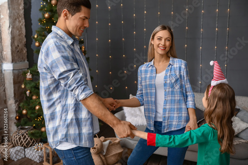 Happy family on Christmas e...