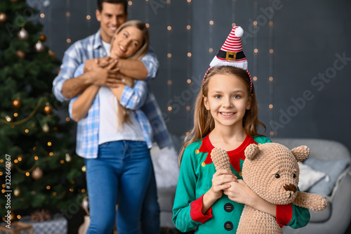 Little girl with teddy bear...