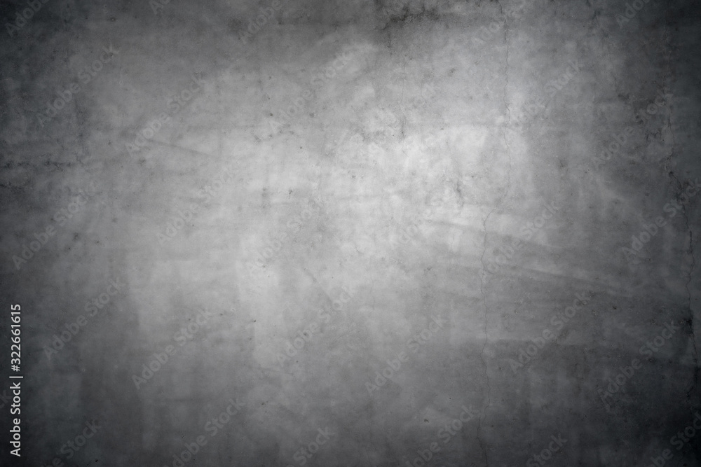 Dark gray concrete texture with vignette as a background Dark gray concrete texture with vignette as a background