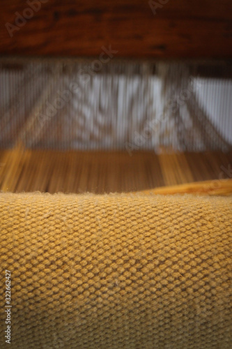 weaving loom in rustic wool