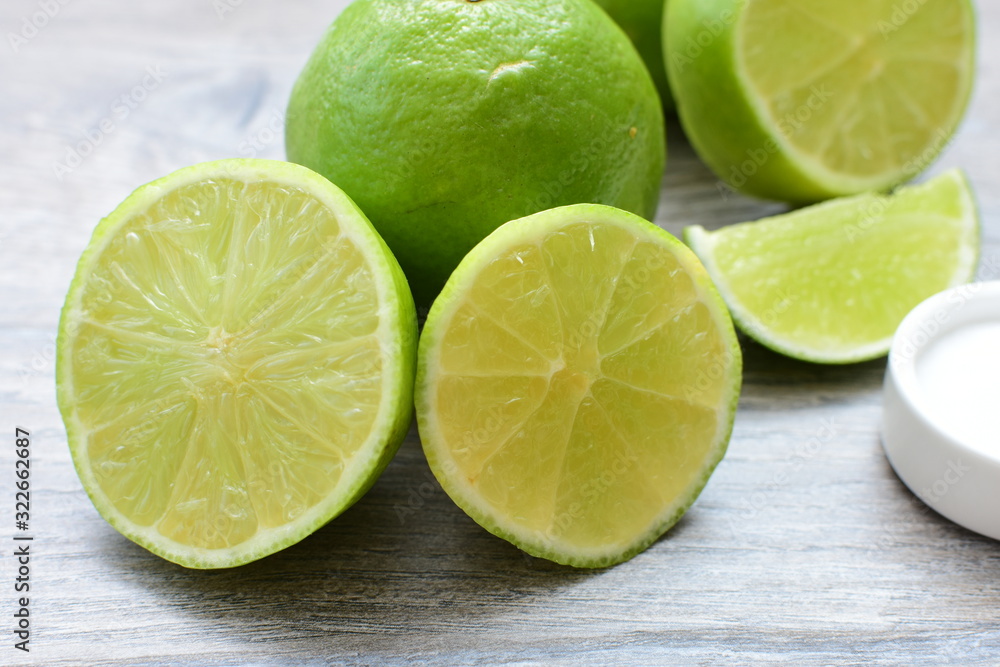 Tahiti lemons, whole and sliced Tahiti lemons, whole and sliced