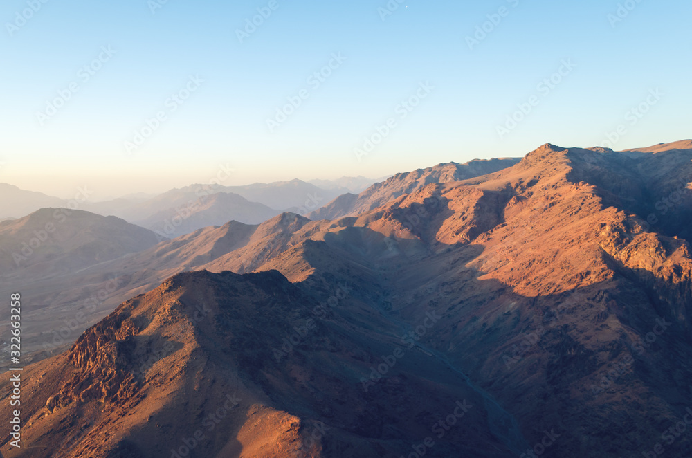 View from the mountain of Moses, a beautiful sunrise in the mountains of Egypt View from the mountain of Moses, a beautiful sunrise in the mountains of Egypt