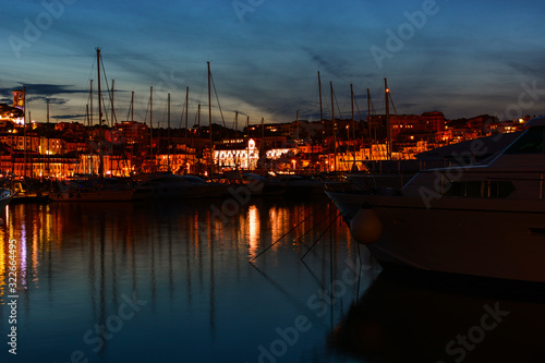 The marina and beautiful cityscape with yachts, Cannes, France 