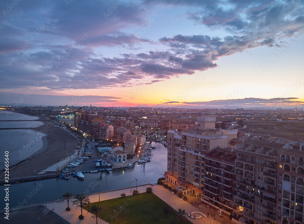 Aerial view of Port Saplaya at sunset. Valencia. Spain