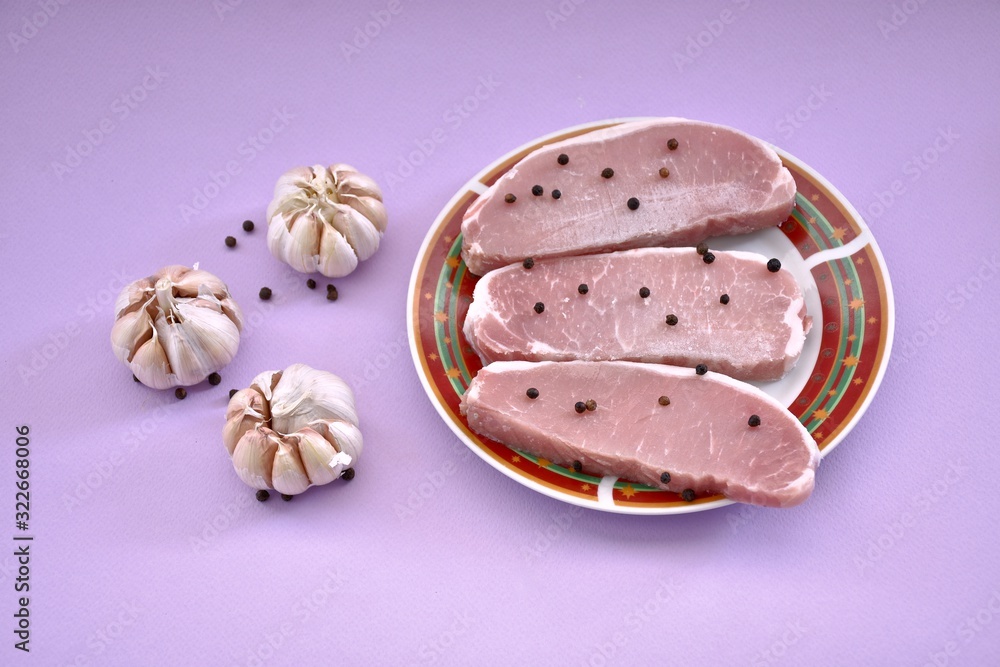 Pork slice, garlic and black pepper to prepare a delicious recipe of cuisine. Pork slice, garlic and black pepper to prepare a delicious recipe of cuisine.