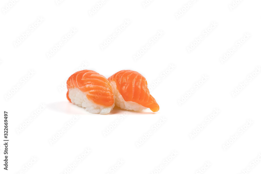 Sushi Salmon, The Japanese traditional food rice ball with fresh salmon fish slice on top. On white clear background with studio light. Clipping path. Sushi Salmon, The Japanese traditional food rice ball with fresh salmon fish slice on top. On white clear background with studio light. Clipping path.