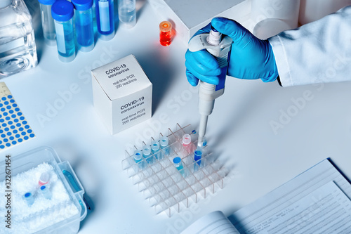 Novel coronavirus 2019 nCoV RT-PCR diagnostics kit. It contains reagents, primers and control samples to detect presence of 2019-nCoV or covid19 virus. In vitro diagnostic by real-time PCR analysis. photo