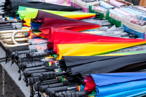 China, Heihe, July 2019: Umbrellas on the counter, morning market in Heihe in summer