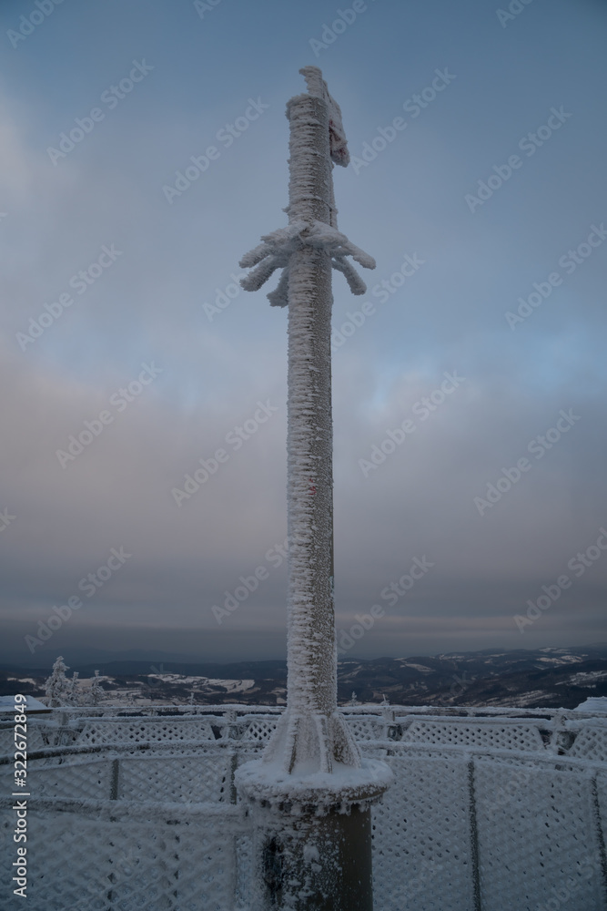 Borowa Gora view point during winter time. Frosty structure, glazed, icy pole. Walbrzych, Lower Silesia, Poland