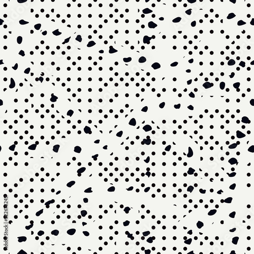 Dotted seamless pattern. Grunge print. Ink spray background. Irregular chaotic black blots, paint spots, drips, splashes