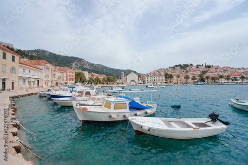 Hvar Old Town Promenade. Sea coast in Dalmatia,Croatia. A famous tourist destination on the Adriatic sea. Old town and marina.