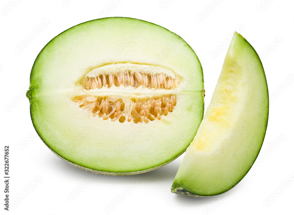 Fresh green melon cut in half with seeds and slice isolated on white background. Melon clipping path. Fresh green melon cut in half with seeds and slice isolated on white background. Melon clipping path.