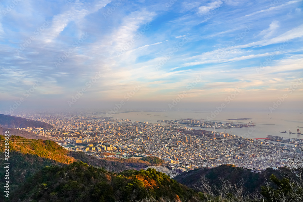 Kobe city panoramic view from Mt. Maya Kikusedai park observatory platform in sunny day sunset time with blue sky background, famous by the 10 ten million dollar night views. Hyogo Prefecture, Japan Kobe city panoramic view from Mt. Maya Kikusedai park observatory platform in sunny day sunset time with blue sky background, famous by the 10 ten million dollar night views. Hyogo Prefecture, Japan
