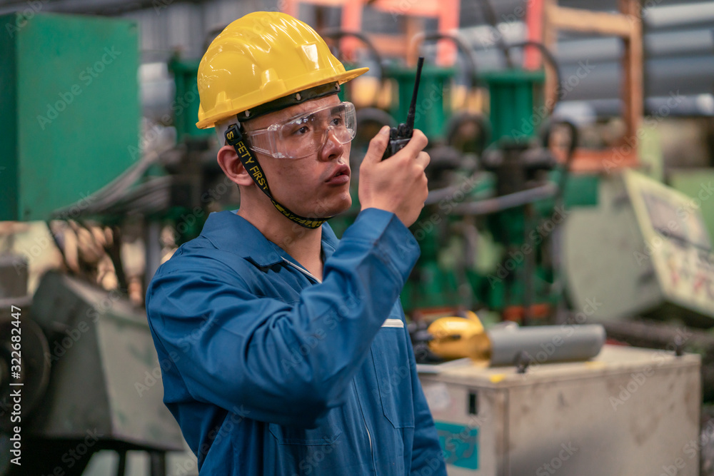 Professional asian worker team, quality control, stand maintenance, talk in the Warehouse factory. Team Engineer Factory operator Operating meetings Professional asian worker team, quality control, stand maintenance, talk in the Warehouse factory. Team Engineer Factory operator Operating meetings
