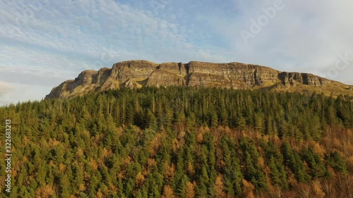 Drone footage of beautiful Binevenagh mountain during golden hour light on the NW coast of N. Ireland photo