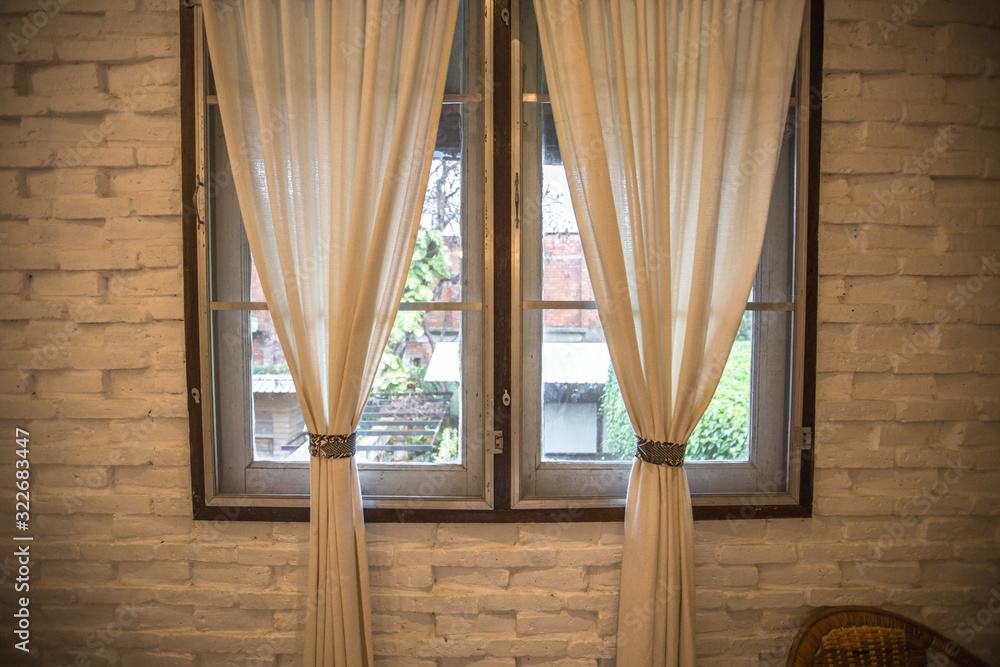 Obraz premium Blurred background view from the bedroom window,where there is rain outside and see the green garden fading,cool weather on holiday days