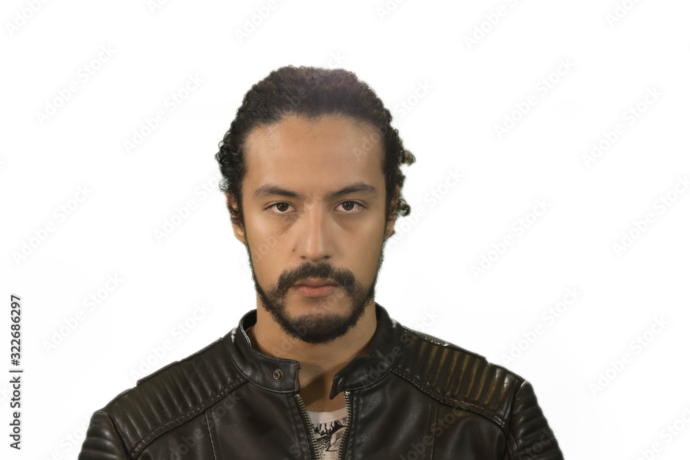 Fototapeta premium portrait of attractive Latin young in rocker jacket, on white background, with acoustic guitar