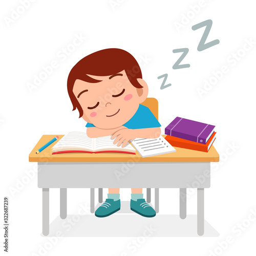 happy cute little kid boy sleep in class