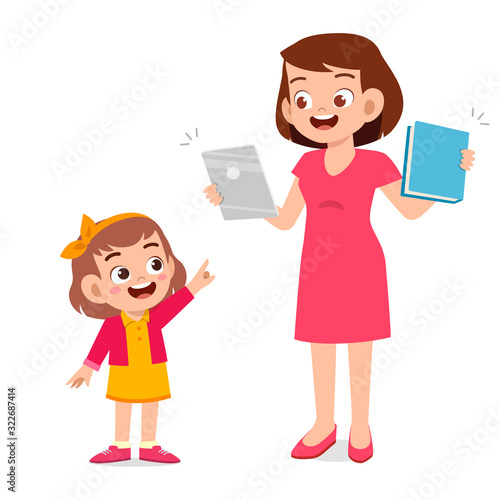 happy cute little kid girl with mom holding tablet
