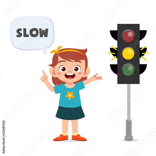 happy cute kid girl with traffic sign