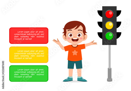happy cute kid boy with traffic sign