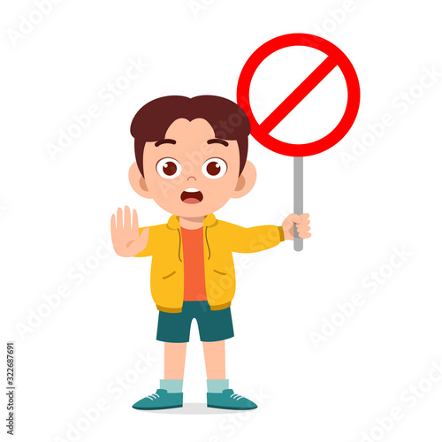 happy cute kid boy with traffic sign