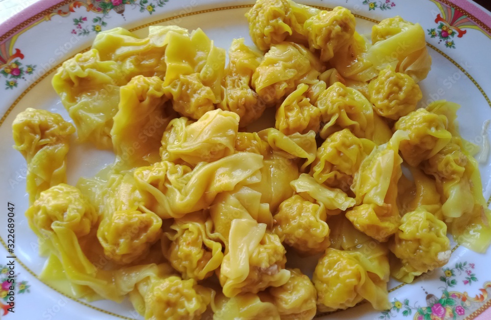 Yellow palanate in a white plate Yellow palanate in a white plate