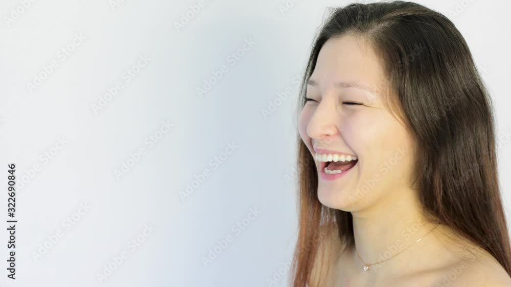 Smiling girl shows skin and teeth care. Has excellent cosmetics and dental accessories for oral care. Smiling girl shows skin and teeth care. Has excellent cosmetics and dental accessories for oral care.