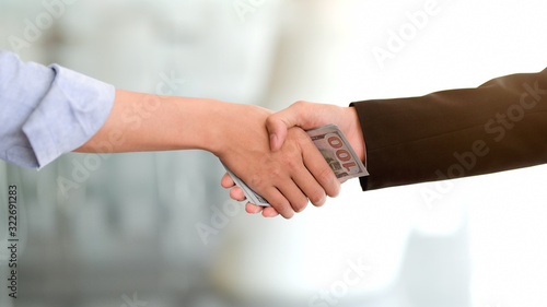 Close up view of real estate agent and customer shaking hand © bongkarn