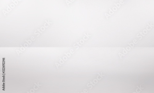 Gray empty room studio gradient abstract background blurred white light. used for background wallpaper backdrop and display your product.