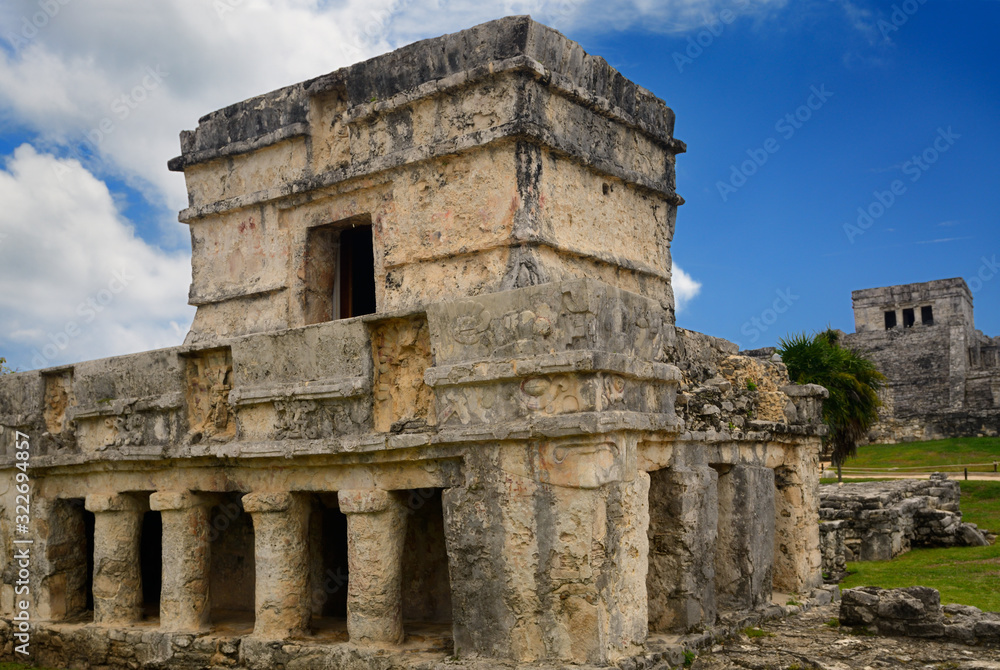 Temple of the Frescoes ruin with The Castle pyramid at Tulum Mexico