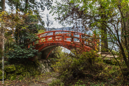 orange torii bridge in Hakone Shrine in Lake Ashi, Japan © anyabr