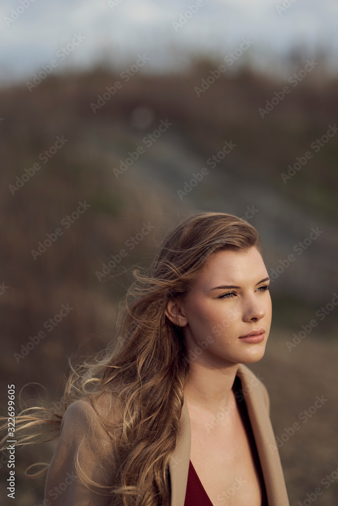 young blonde girl in field young blonde girl in field