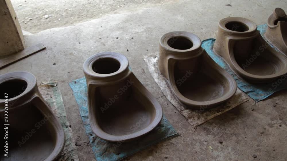 Cooking pots being dried up in the Philippines Cooking pots being dried up in the Philippines