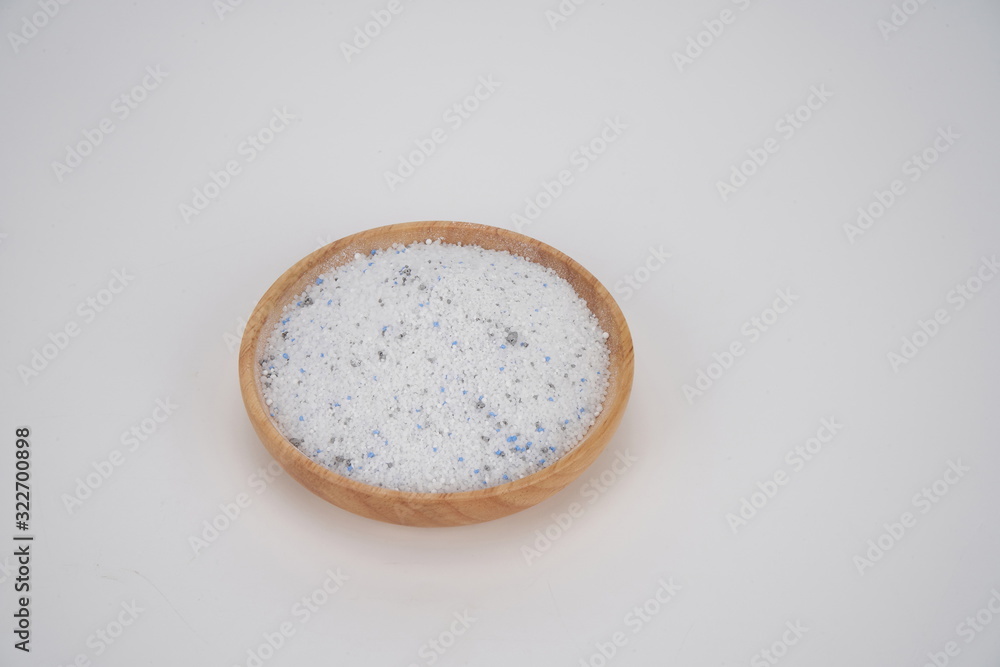 Pipeline drying agent powder is placed on a wooden plate against a white background Pipeline drying agent powder is placed on a wooden plate against a white background