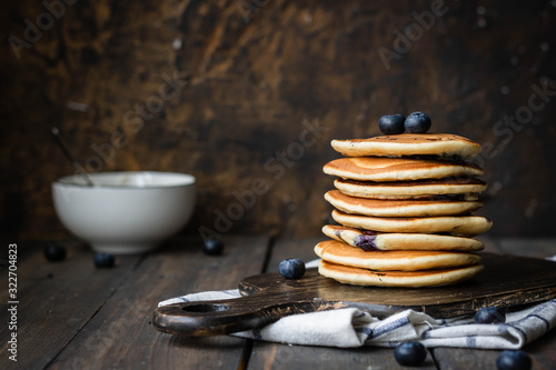 Wallpaper Mural ricotta pancakes with blueberries on a dark wooden background Torontodigital.ca