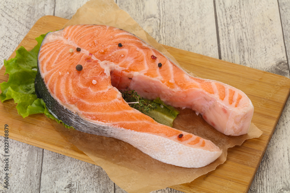 Raw salmon steak - ready for grill Raw salmon steak - ready for grill