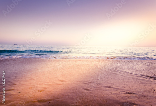 Sunset on the beach of Our Lady of Rocha in Lagoa, Algarve, Portugal. photo