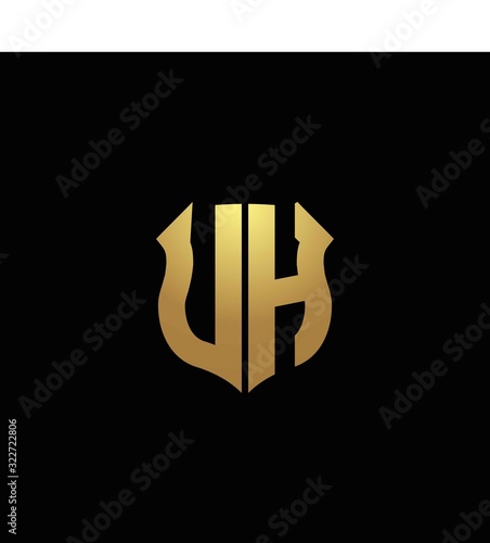 UH logo monogram with gold colors and shield shape design template photo