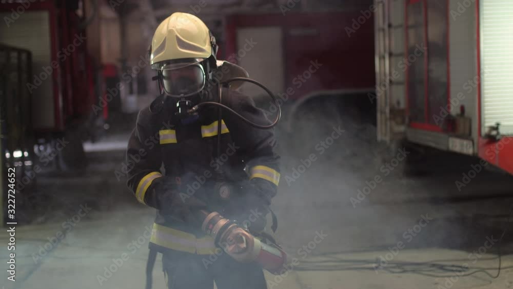 female firefighter portrait wearing full equipment, oxygen mask, and emergency rescue equipment, hard tool, smoke and fire trucks in the background. female firefighter portrait wearing full equipment, oxygen mask, and emergency rescue equipment, hard tool, smoke and fire trucks in the background.